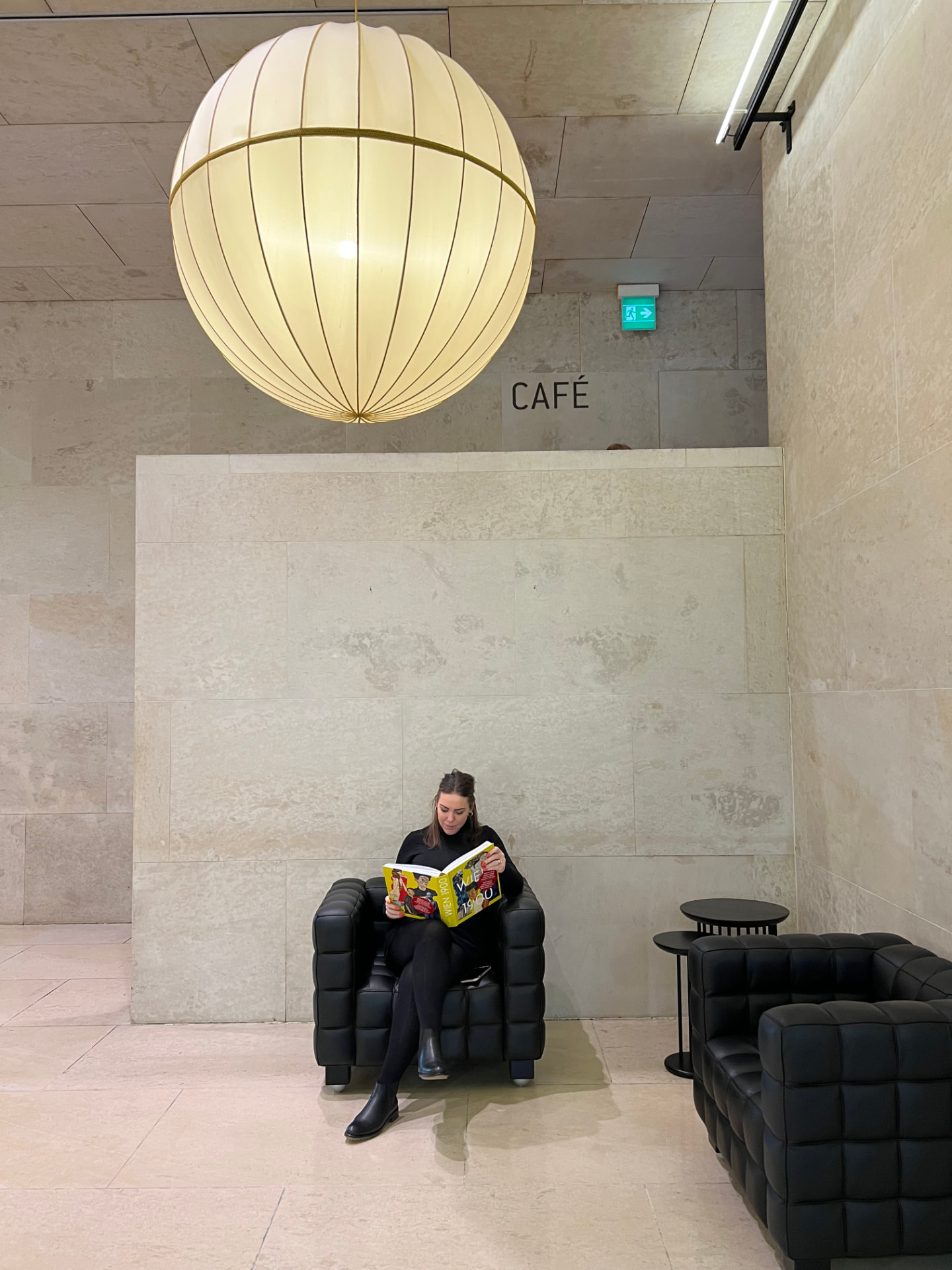 Vibeke Wessel Finstad reading in a museum café